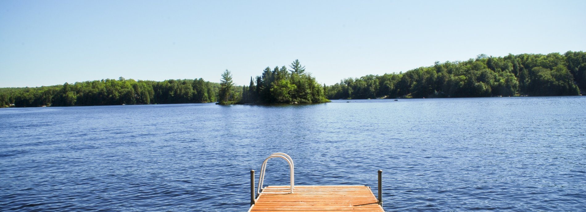 dock extending into a calm lake