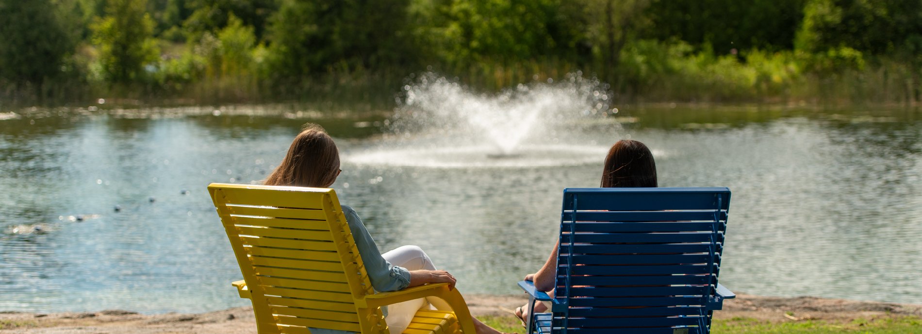 two adults sitting in Washago Centennial Park